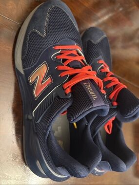 New Balance Navy Sneakers with Red Laces and Red Logo Accent